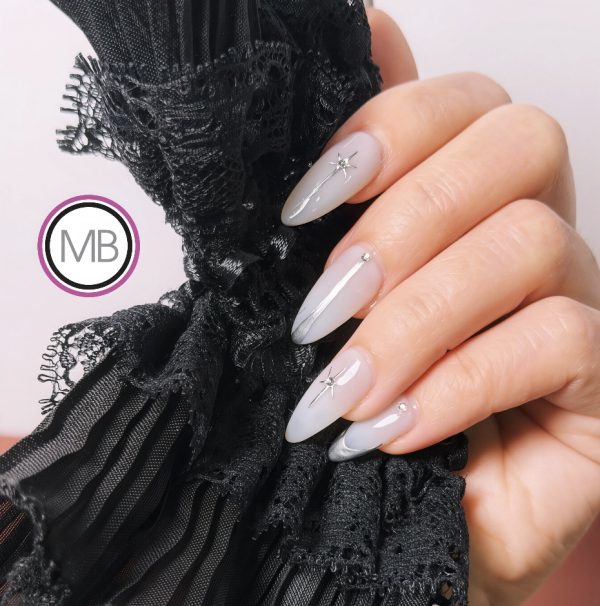 Silver gray ombre almond nails with star sparkle and crystal rhinestone accents by ManiBliss nail salon Alpharetta GA